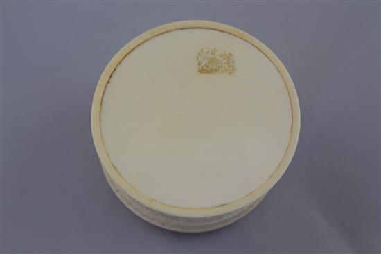 A Chinese ivory dragon drum shaped box and cover, early 20th century, diam. 10.5cm